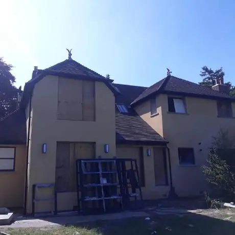 Roofing in Golborne: large detached house during a roof renovation
