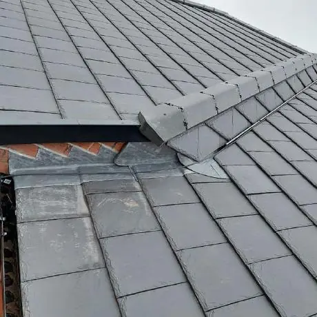 Roofing in Leigh: slate roof valley with lead flashing
