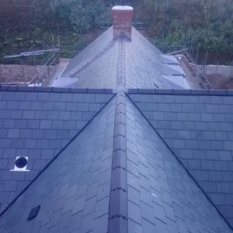 Roofing near Leigh: slate roof valley viewed from the ridge