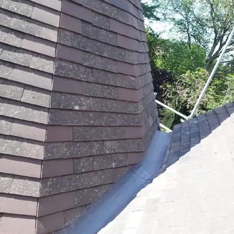 Roofing near Ormskirk: lead flashing running down a tiled hip