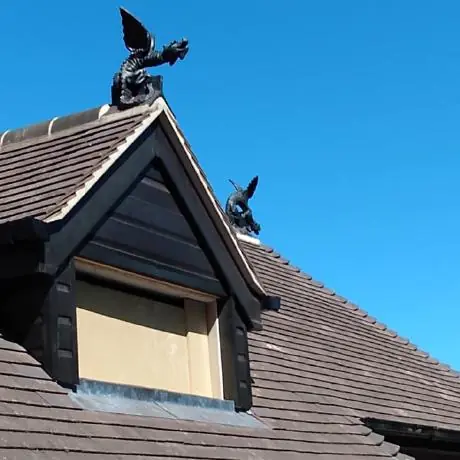 Roofing near Billinge: dormer window with an ornamental roof finial
