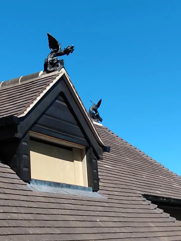 Hip roof tiles laid by roofers in Wigan